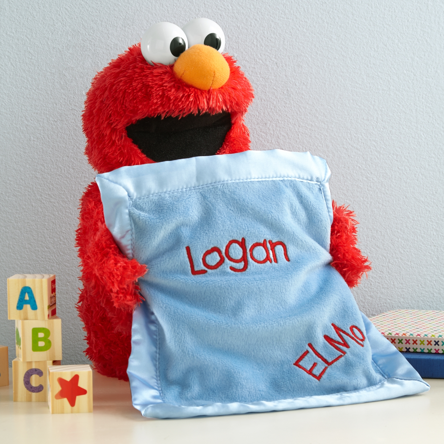 elmo plays peek a boo