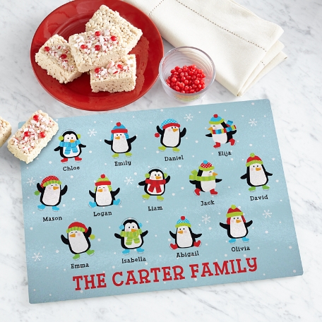 Playful Penguins Glass Cutting Board