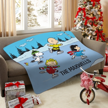 PEANUTS® Ice Skating Friends Plush Blanket