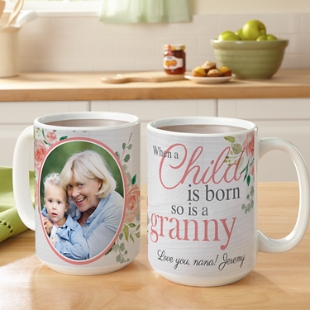 When a Child is Born Photo Mug